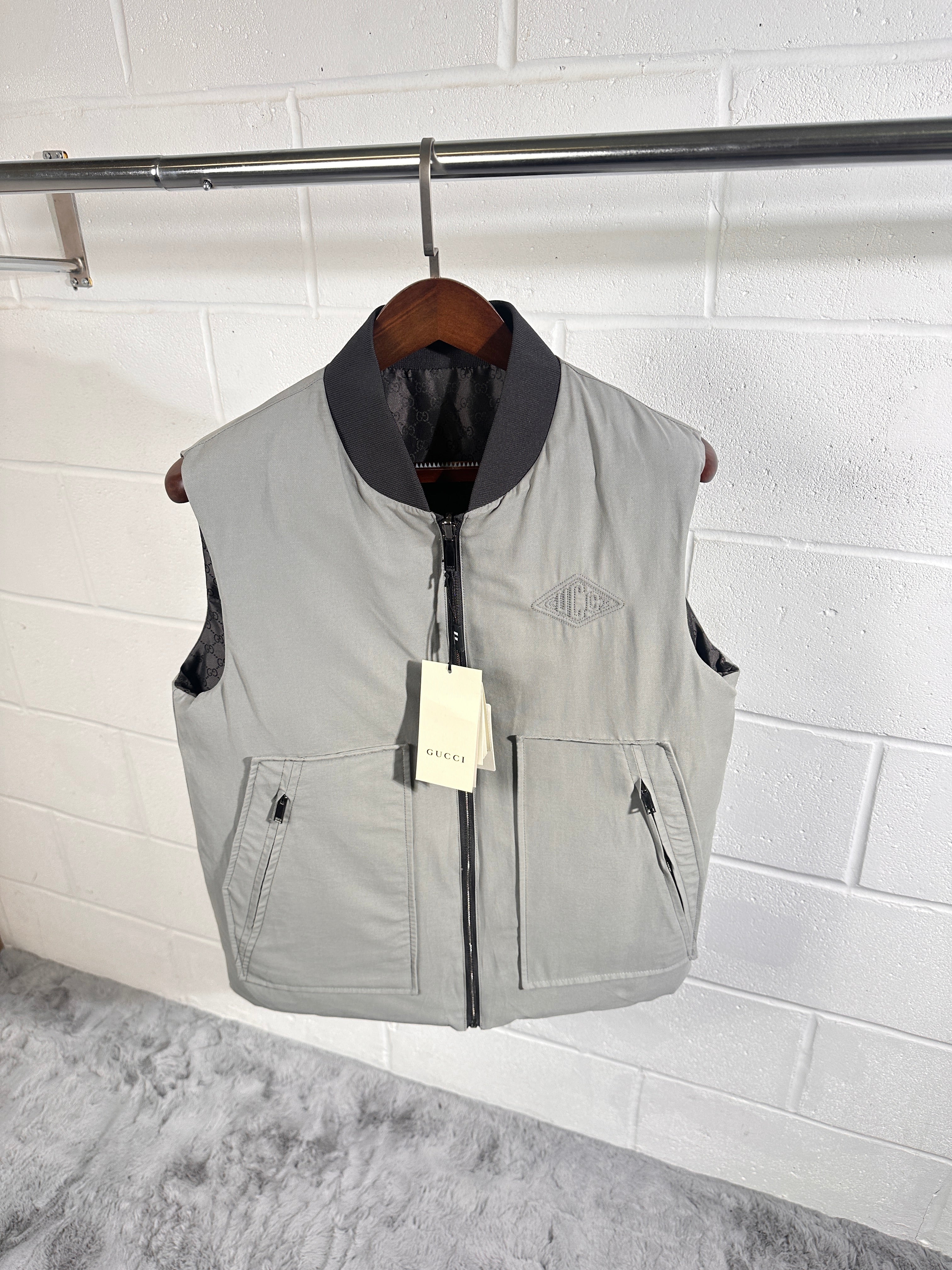 Gucci reversible body warmer grey