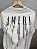 AMRI Tees