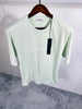 SI tee light green