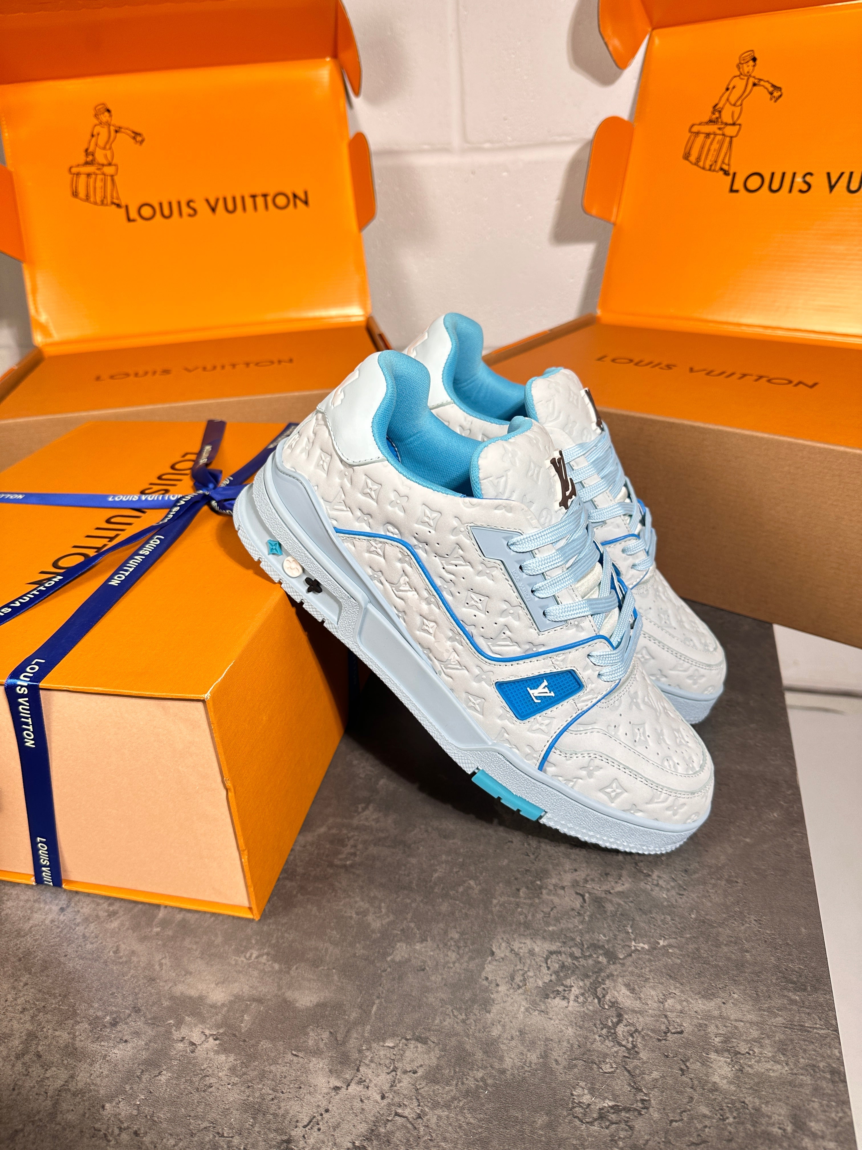 Lv baby blue logo trainers